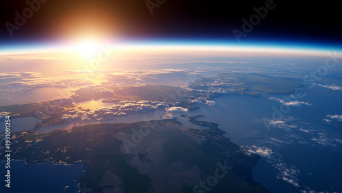 Bild auf Leinwand The sun rises over the curvature of the earth as seen from orbit