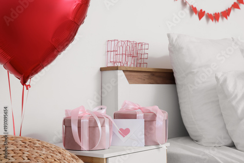 Bedside table with gifts an...