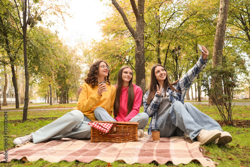Happy teenage girls with cu...