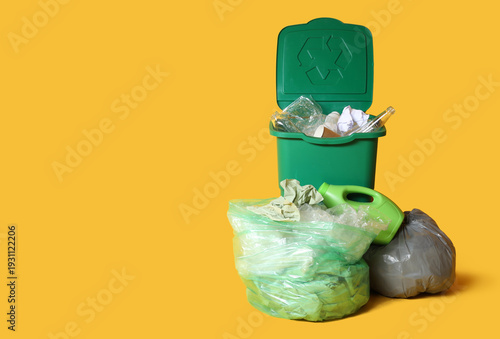 Trash bin with full garbage...