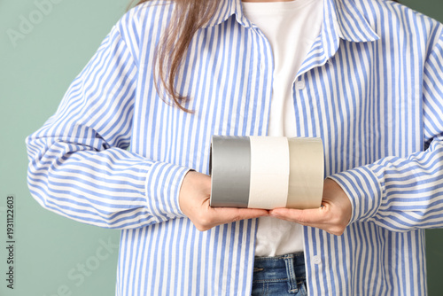 Young woman with adhesive t...