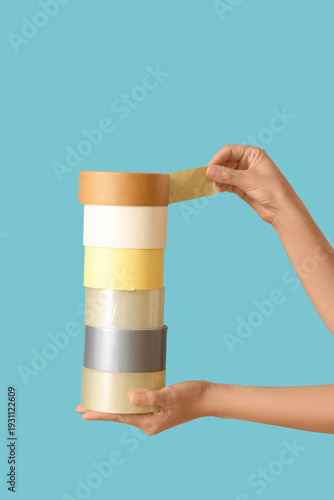 Female hands with adhesive ...