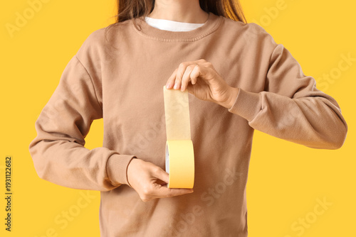 Young woman with adhesive t...
