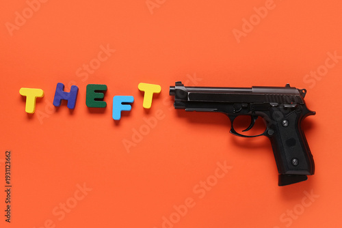 Word THEFT with gun on oran...