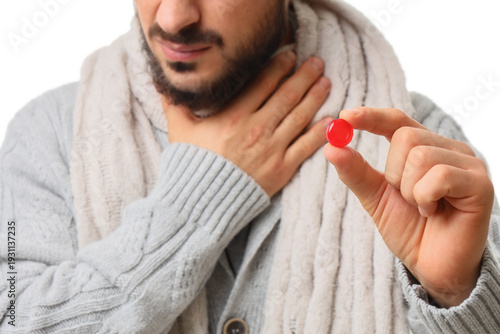 Ill young man with throat l...