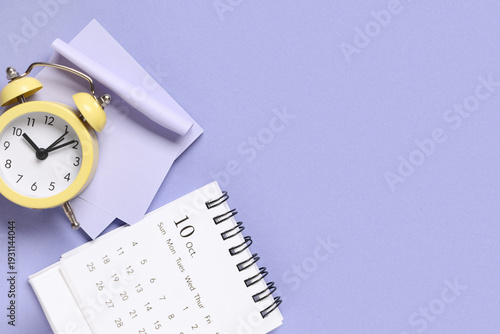 Calendar with alarm clock a...