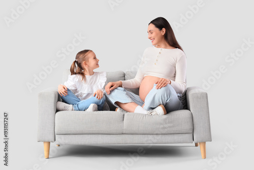 Happy pregnant woman and he...