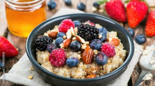 Vibrant and nutritious breakfast scene with oatmeal, blueberries, raspberries, and nuts, highlighting healthy eating and delicious flavor combinations in close-up view.