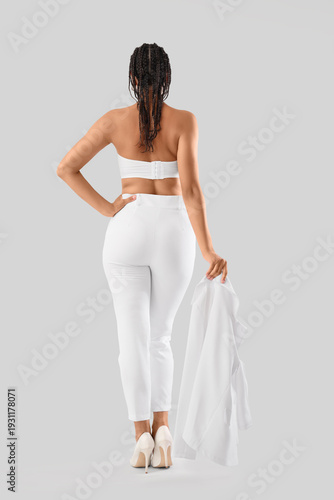 Stylish young woman with dr...