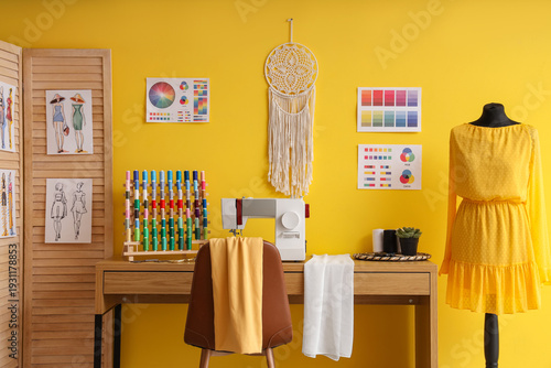 Schilderij op canvas Interior of atelier with tailor's workplace, mannequin and folding screen