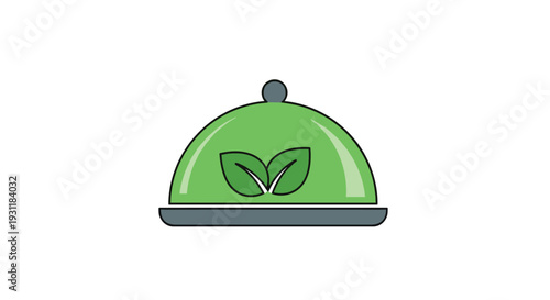 Green food cloche or dome cover decorated with organic leaves on a tray representing vegan meals and environmentally friendly catering.