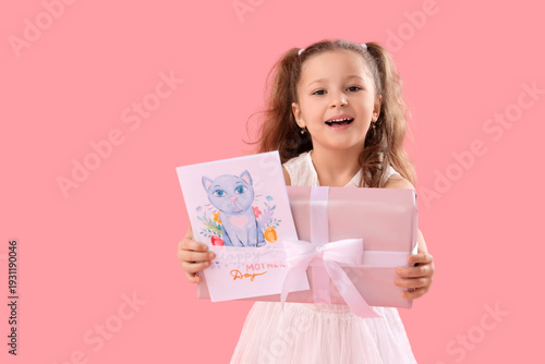 Cute little girl with gift ...