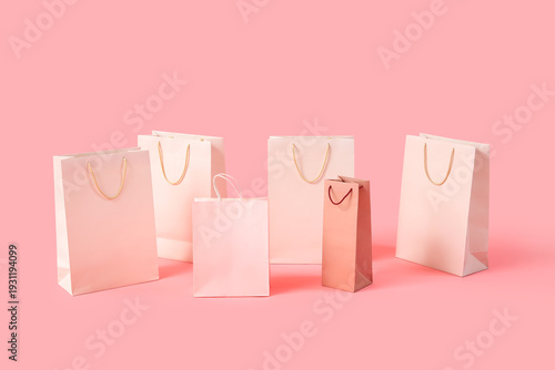 Shopping bags on pink backg...