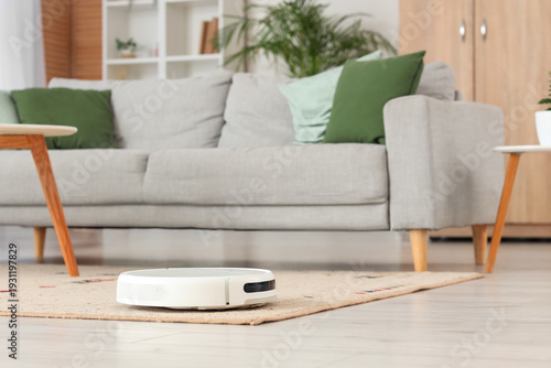 Robot vacuum cleaner on car...