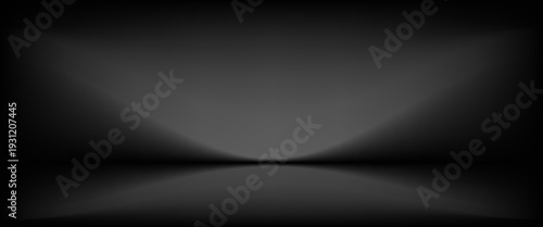 dark black background studio room with light beam from above for product display. floor and wall backdrop muslin design backdrop. stone surface texture podium.