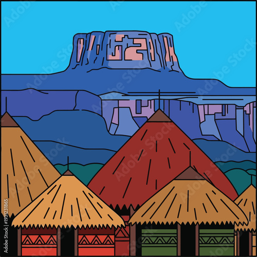 Traditional african village huts with large plateau mountain in background