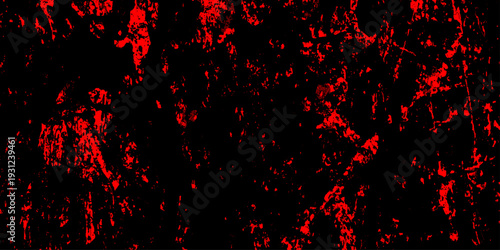 Abstract dark red or black background with fiery red streaks and splatters, red hot sparks on a black background, the concept of risk of fires, abstract grunge textures in vivid contrast.