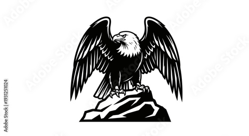 Majestic eagle standing proudly on rocky outcrop with wings spread