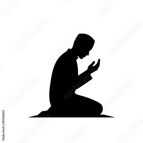 Muslim man praying silhouette.