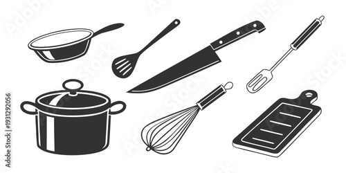 An assortment of kitchen utensils and tools for cooking and baking