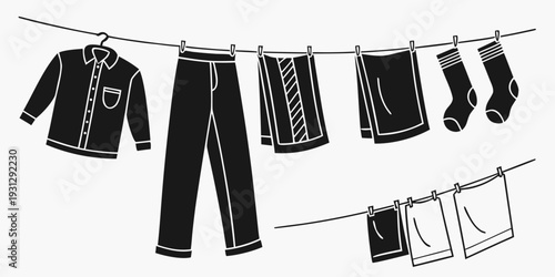 A variety of clothing items hanging on a clothesline to dry
