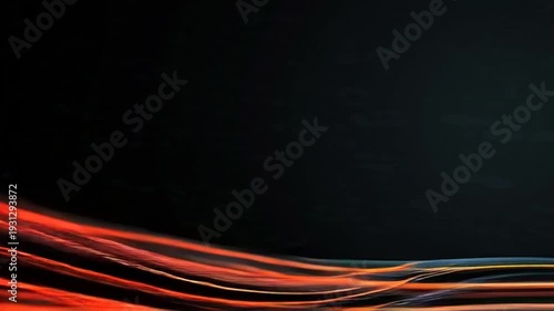 Vibrant orange and yellow vector eps lines wave across a dark background.