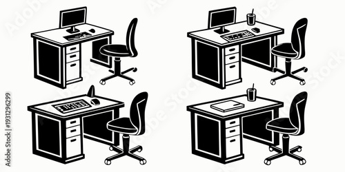 Four identical desks with computers and chairs arranged in a square formation.