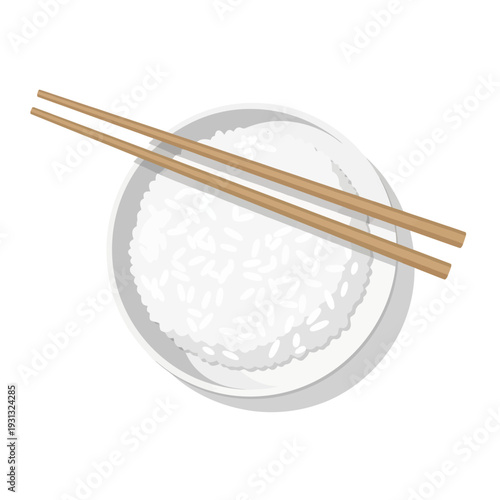 Chopsticks on a bowl of white rice.