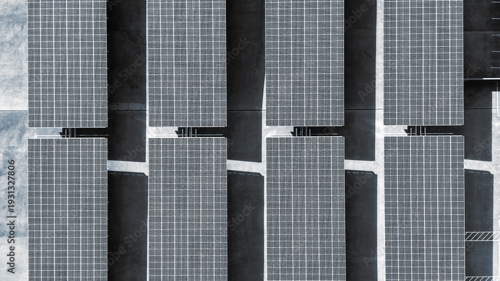 Fototapeta premium Solar panel array generating clean renewable energy on roof top