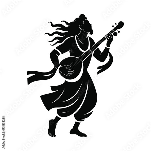 Man playing traditional Indian string instrument veena