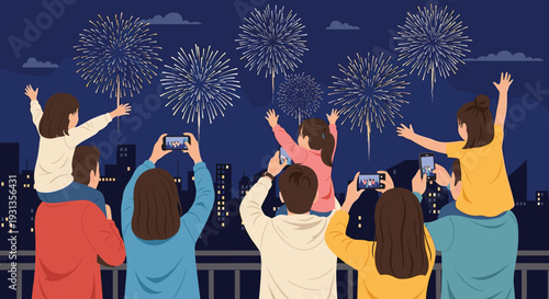 Group of people seen from behind watching a spectacular firework display over a city skyline at night and taking photos.