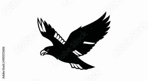 Silhouette of a black bird with wings spread wide, soaring dynamically