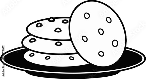 Stacked cookies with a few chips on a dark plate