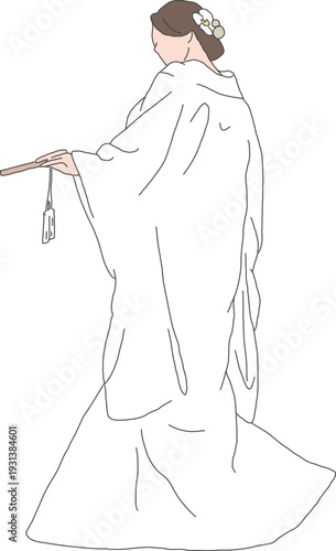 白無垢を着て扇を持つ女性