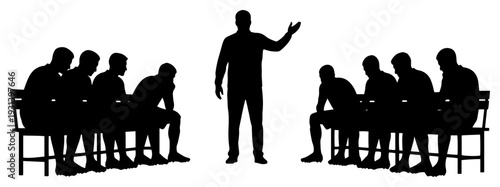 Black silhouette of a soccer coach talking to players on the bench during a match