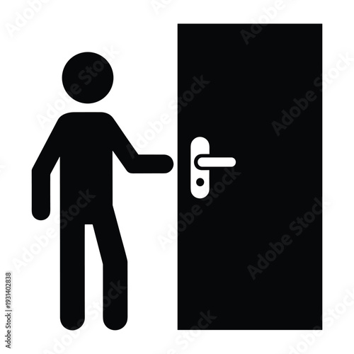 Person standing by a closed door reaching for the handle to enter or exit room or building