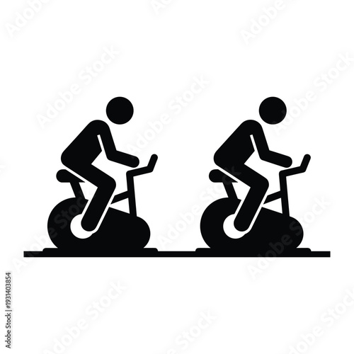 Two people exercising on stationary bikes in a gym setting for fitness health and cardio workout training