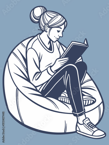 Young woman reading a book in a comfortable bean bag chair.