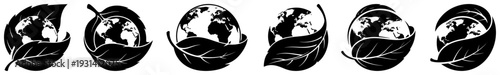 Minimalist planet earth globes resting on green leaves as symbols of environmental protection and eco awareness
