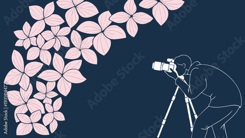 Photographer capturing beautiful cherry blossom flowers on a dark background.