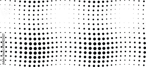 Black halftone dots form two distinct rounded concentrations creating an interesting visual pattern on a white surface