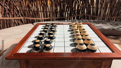 Canvastavla Classic Gulf‑region Dama, a tactical two‑player game similar to checkers, emphasizing sharp planning and territorial control