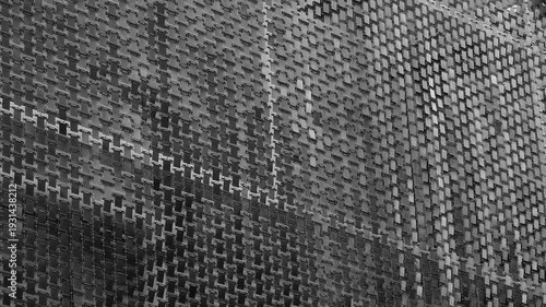 Woven plaid texture shows worn wool fibers in charcoal tones