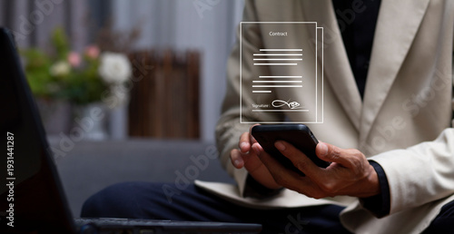 digital signature or e-signature contract agreement and businessman use smartphone application with internet browser at workplace