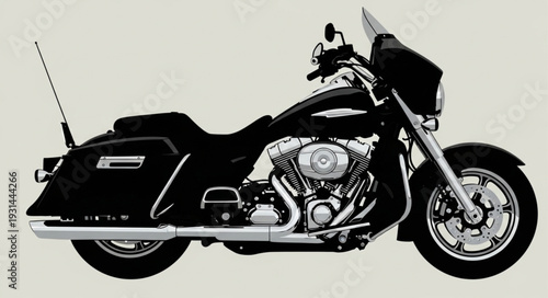 Black touring motorcycle with chrome details and windshield.