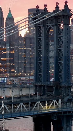 Brooklyn Bridge At Manhattan In New York United States. Highrise Buildings Landscape. Colorful Sunset. Brooklyn Bridge At New York United States. Stunning Cityscape. 