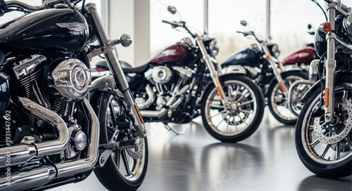 Several parked motorcycles in a showroom interior.
