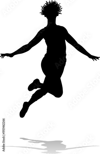 A happy woman jumping for joy in mid air silhouette person concept