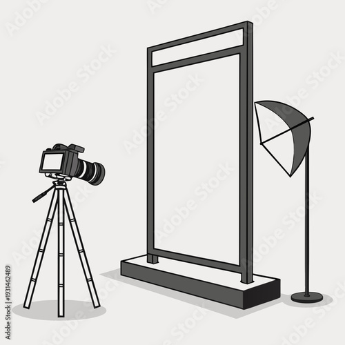 Professional studio setup with camera on tripod and large blank display for photography.