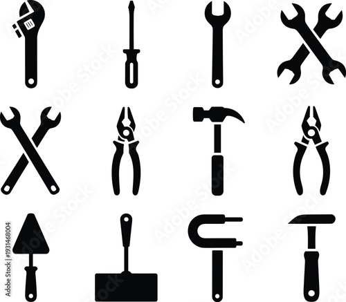 Black and white of various hand tools and construction equipment wrench